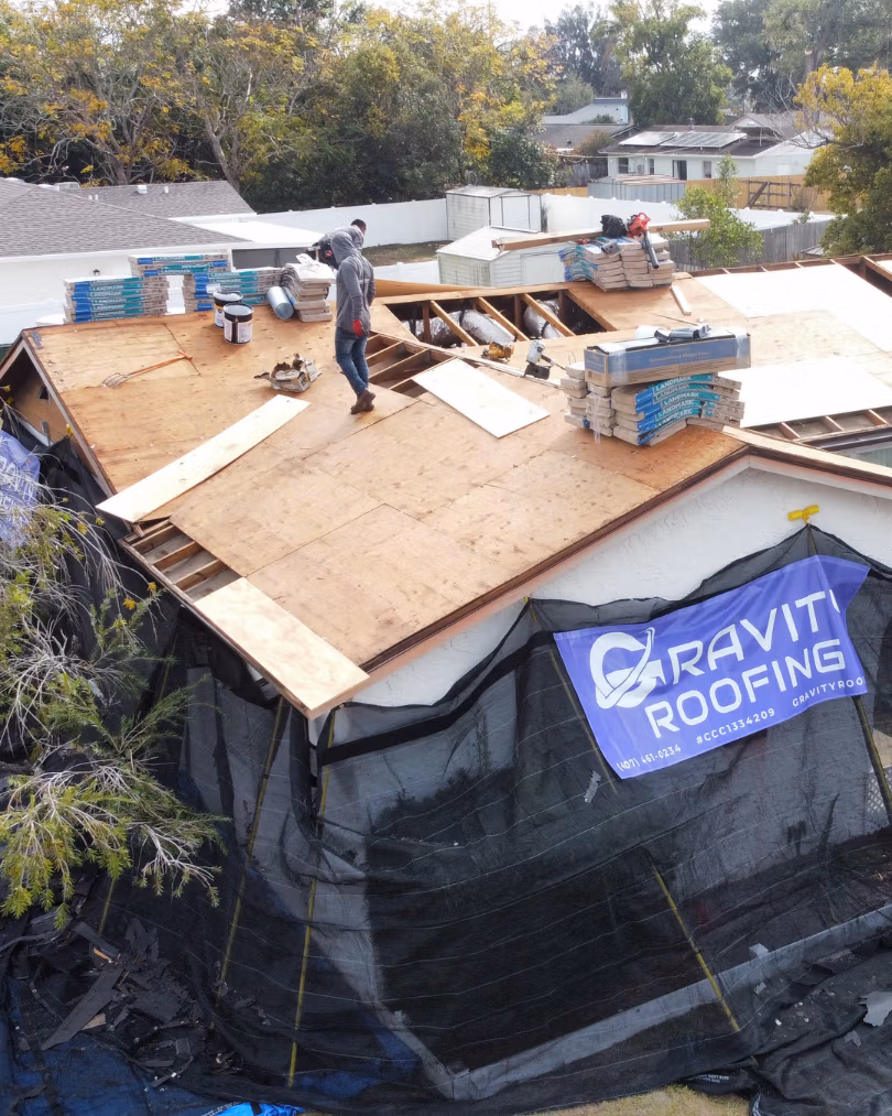 a man standing on a roof