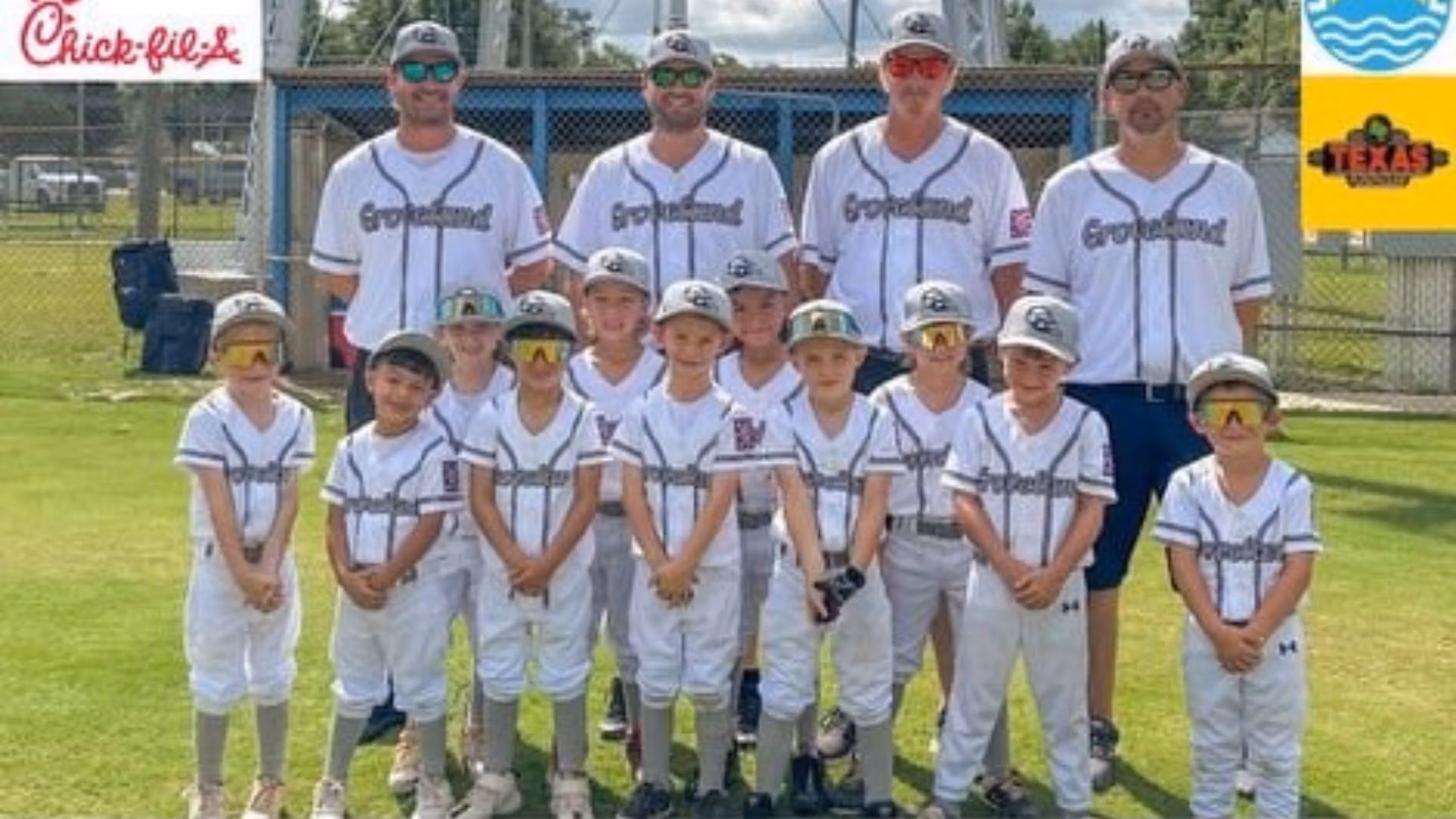 Group photo of the Groveland 6U All-Star Baseball Team in white uniforms, sponsored by Gravity Roofing, July 2024