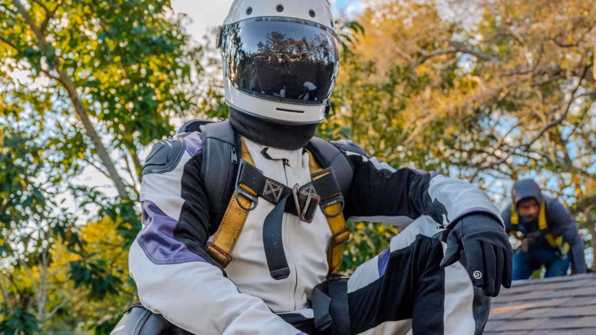 Gravity Roofing's astronaut mascot performing a roof inspection in Central Florida