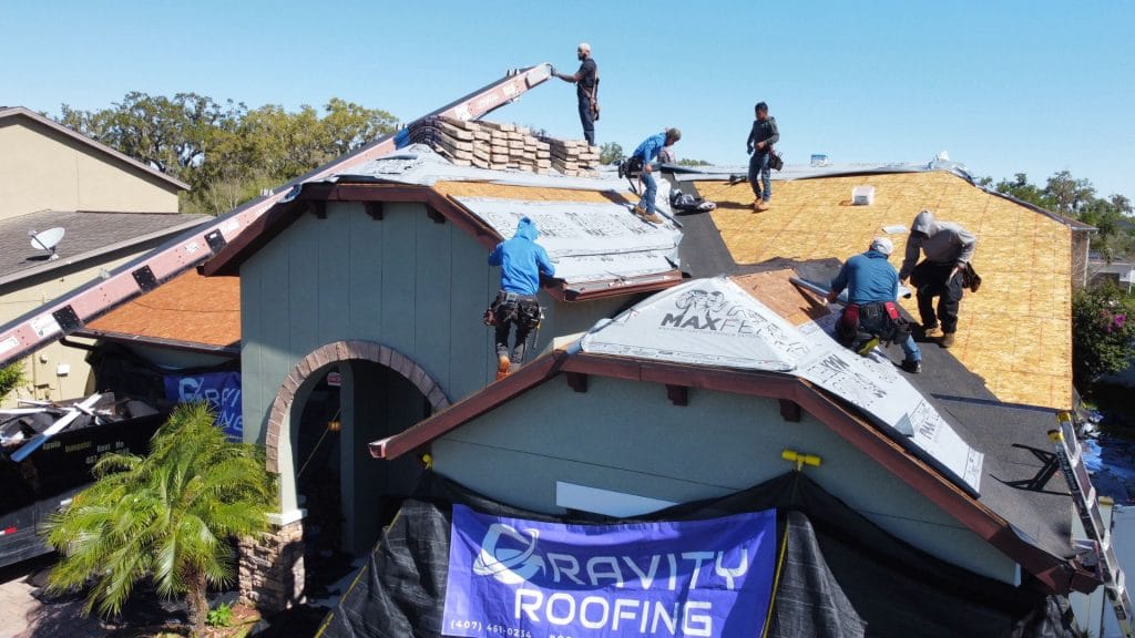 Gravity Roofing crew preparing a roof for installation after a thorough roof inspection in Central Florida