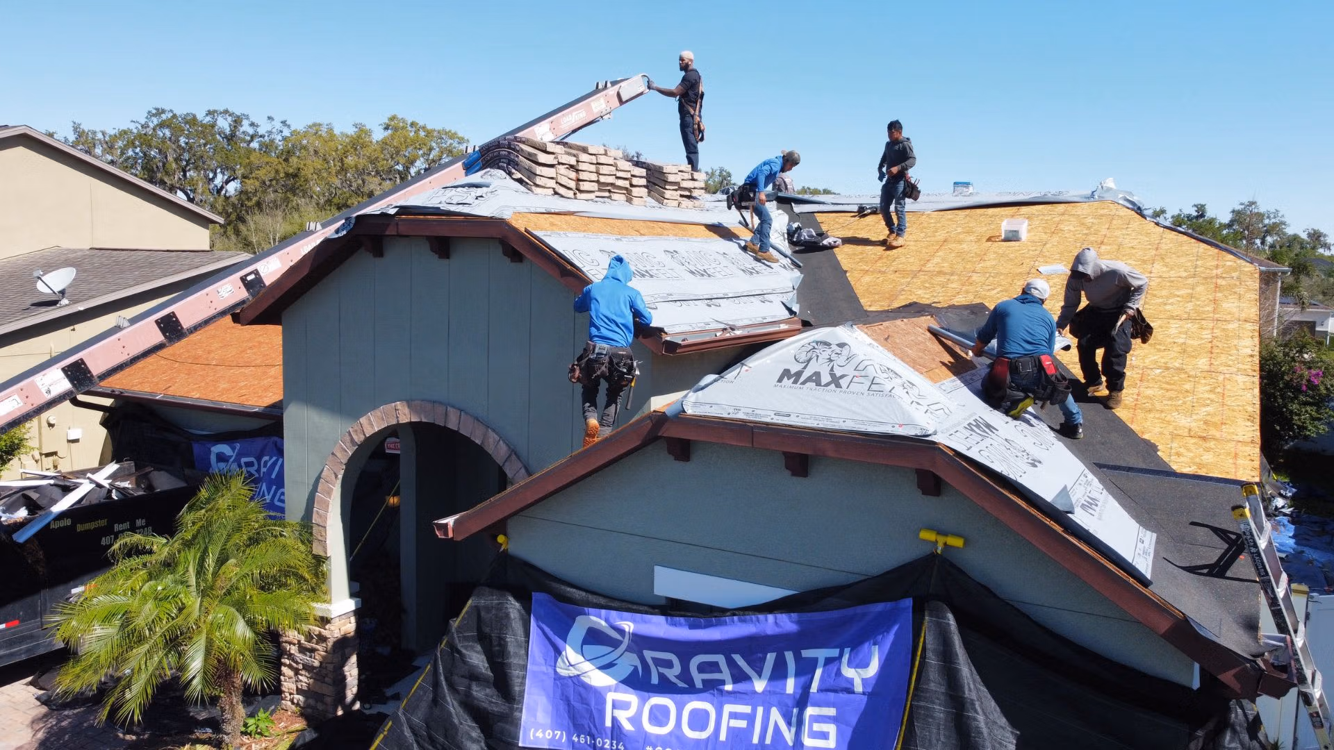 Gravity Roofing crew preparing a roof for installation after a thorough roof inspection in Central Florida