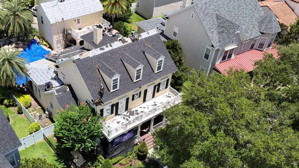 Roof replacement in progress on two-story home in Central Florida