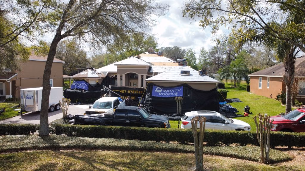 Residential roof replacement in progress with Gravity Roofing team and equipment