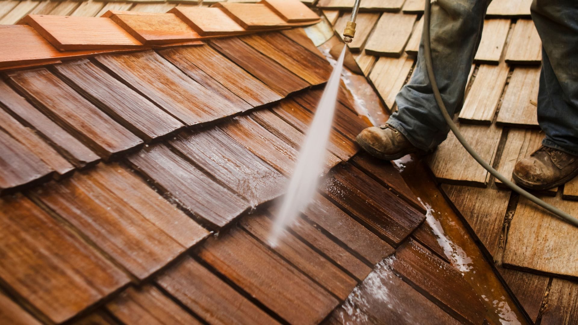 Black Streaks on Your Roof being cleaned with safe soft wash method in Central Florida