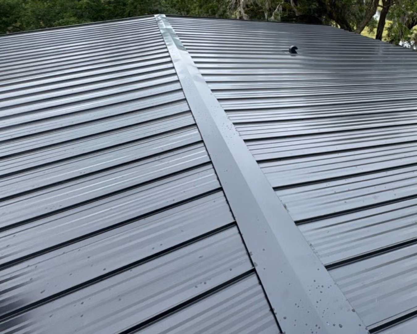 A standing seam metal roof installed on a Florida home featuring concealed fasteners for high wind resistance and coastal durability.