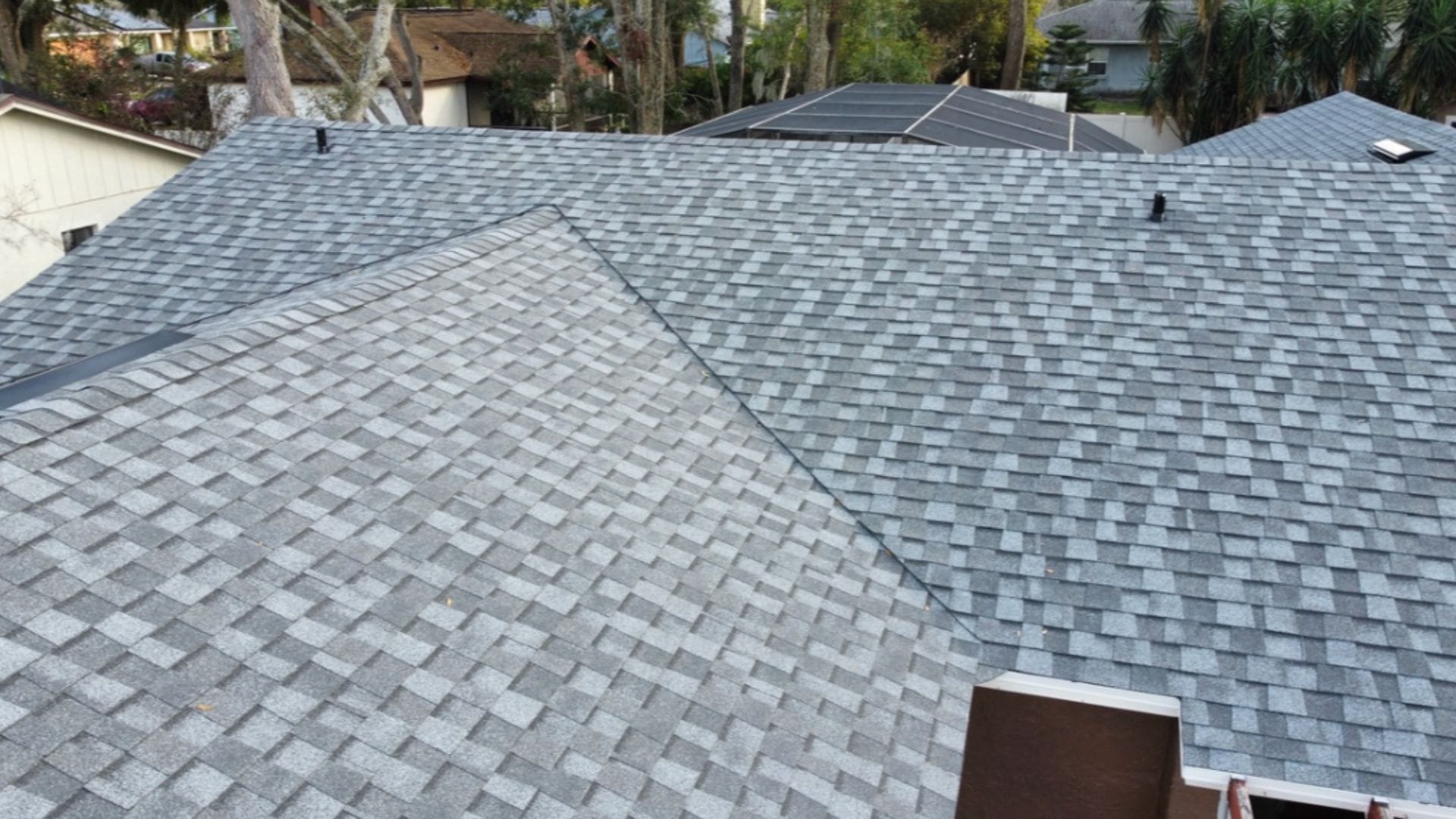 Roof lifespan in Longwood — shingle, tile, and metal roofing comparison for Central Florida homes.