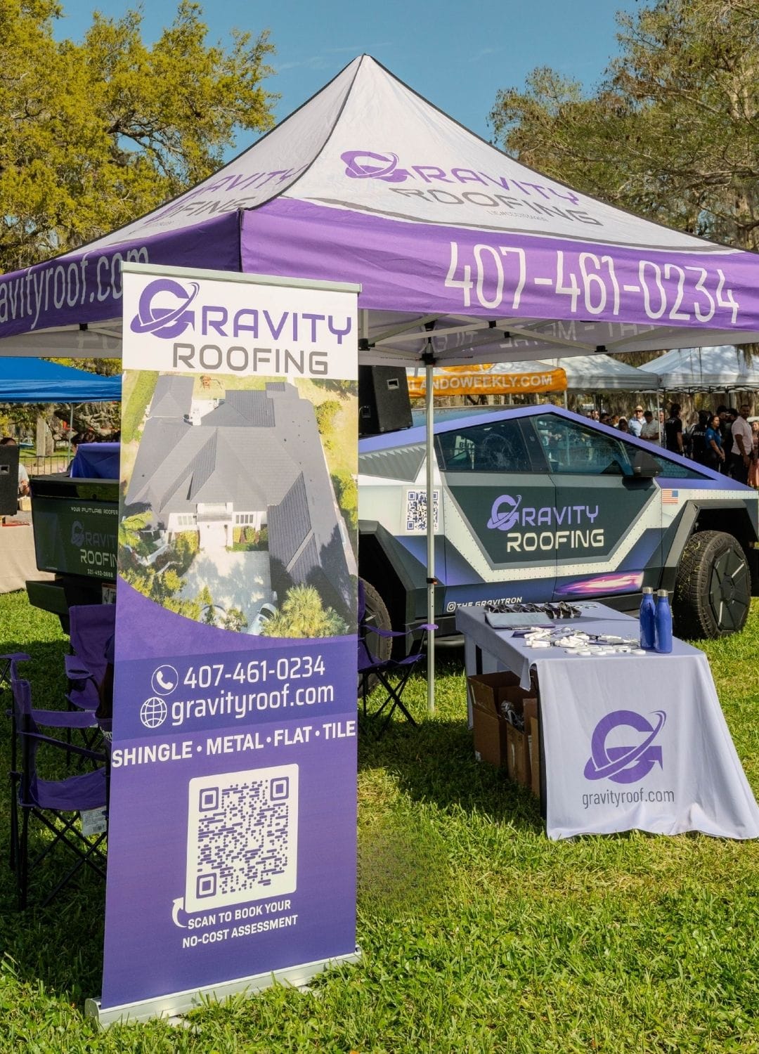 Gravity Roofing booth at Orlando Weekly's Brunch in the Park 2025