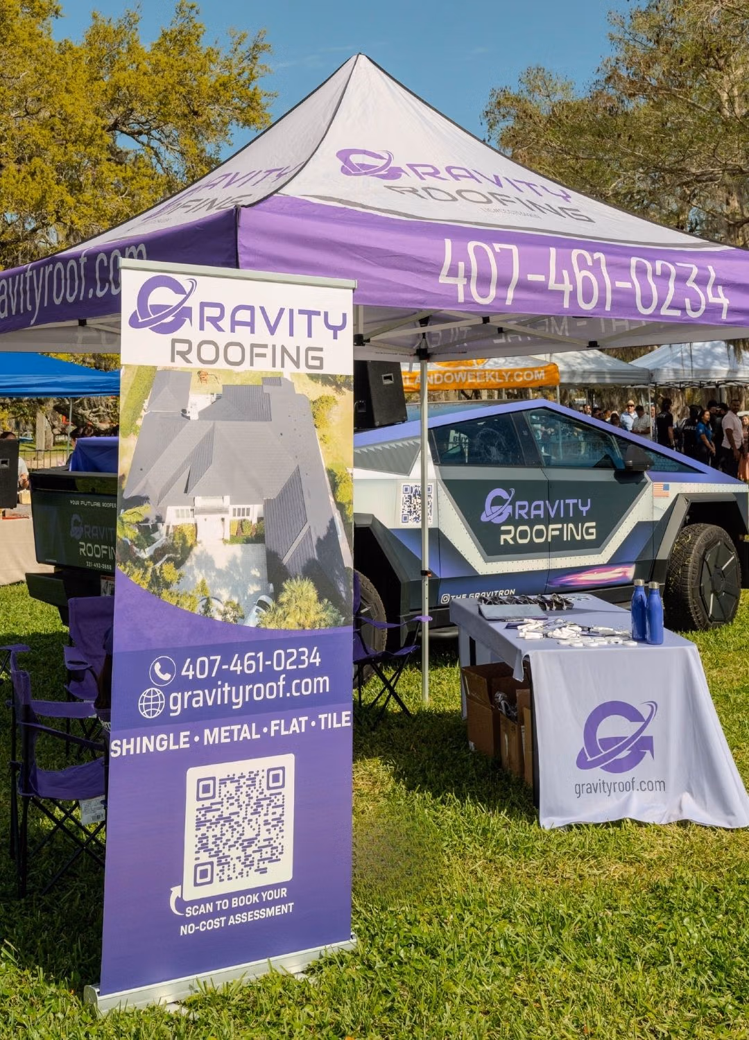 Gravity Roofing booth at Orlando Weekly's Brunch in the Park 2025